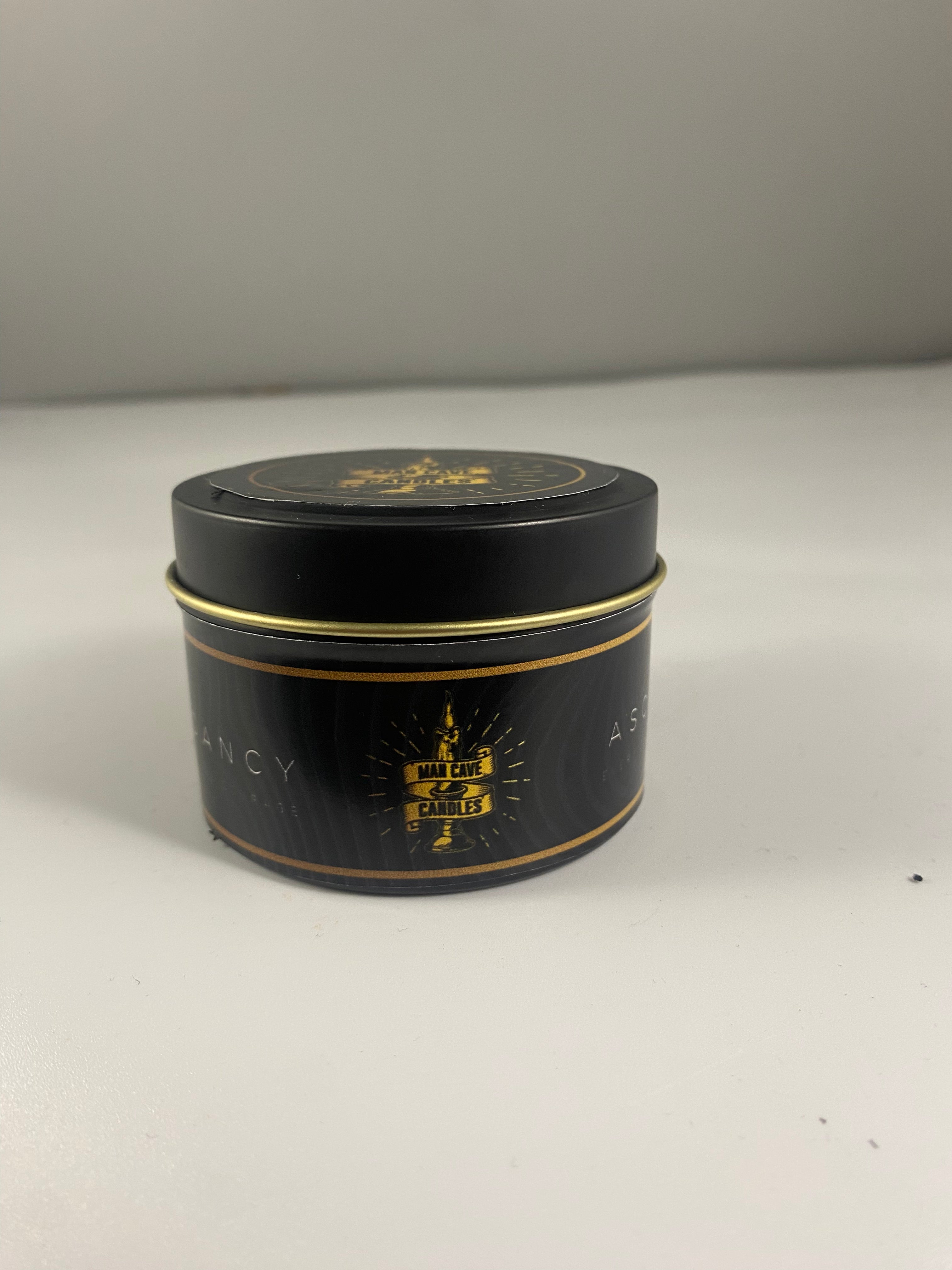 candle black gold